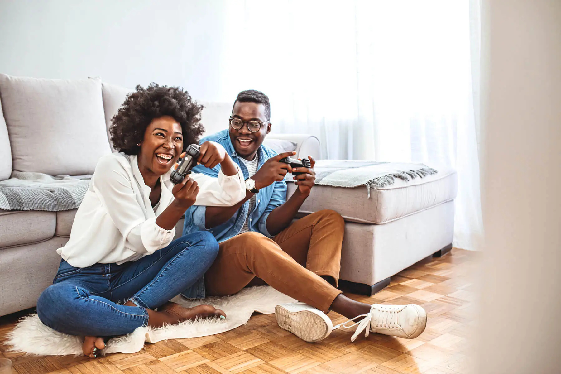 Couple playing game on the carpet